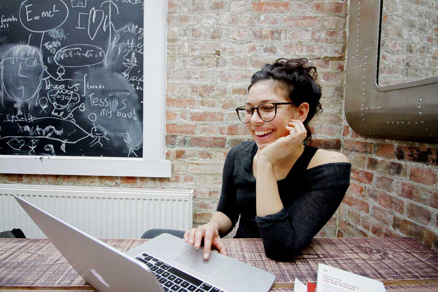 digital marketing manager working on her laptop