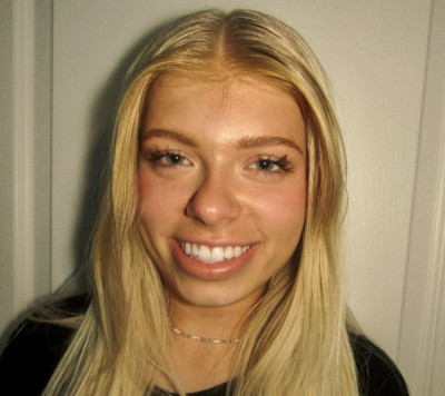 E.