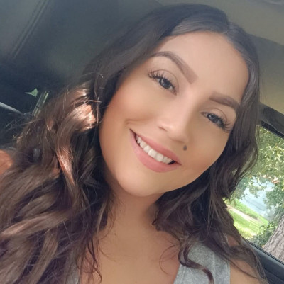L.